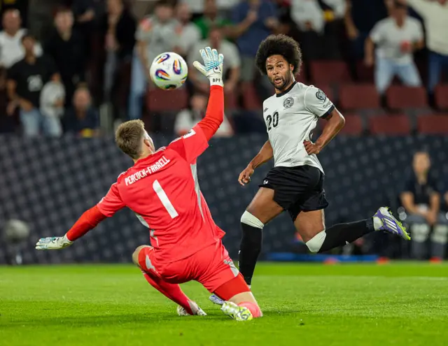Serge Gnabry of Germany scores his team's first goal past Bailey Peacock-Farrell