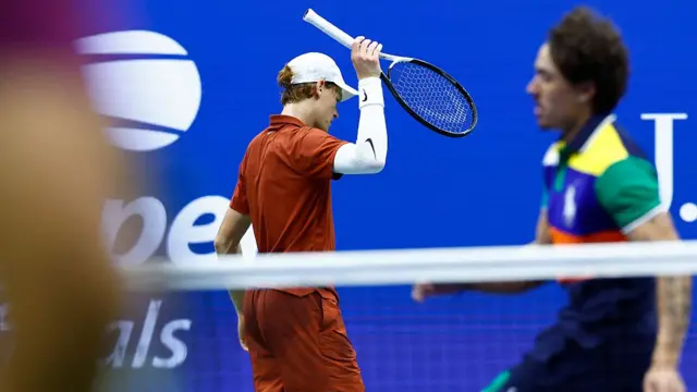 Italy's Jannik Sinner reacts
