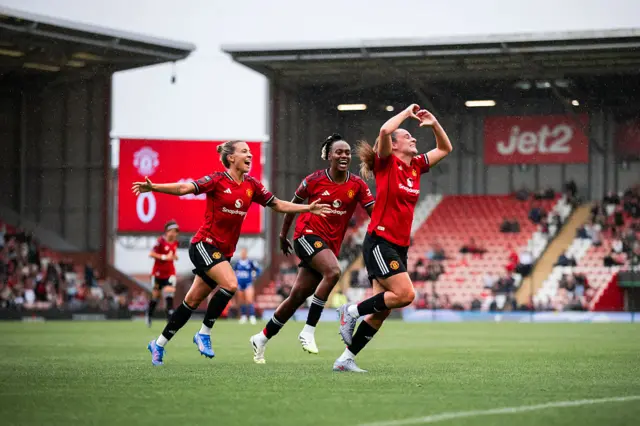 Ella Toone of Manchester United Women celebrates scoring their first goal during the Barclays Women's Super League match between Manchester United and Leicester City at Leigh Sports Village