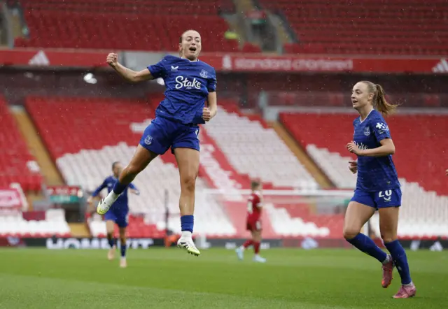 Vignola celebrates her hat-trick by fist pumping the air