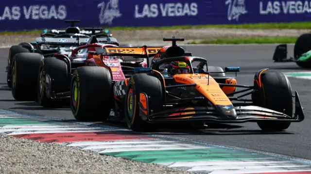 Oscar Piastri ahead of Charles Leclerc