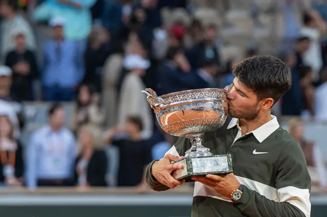 Carlos Alcaraz with French Open trophy