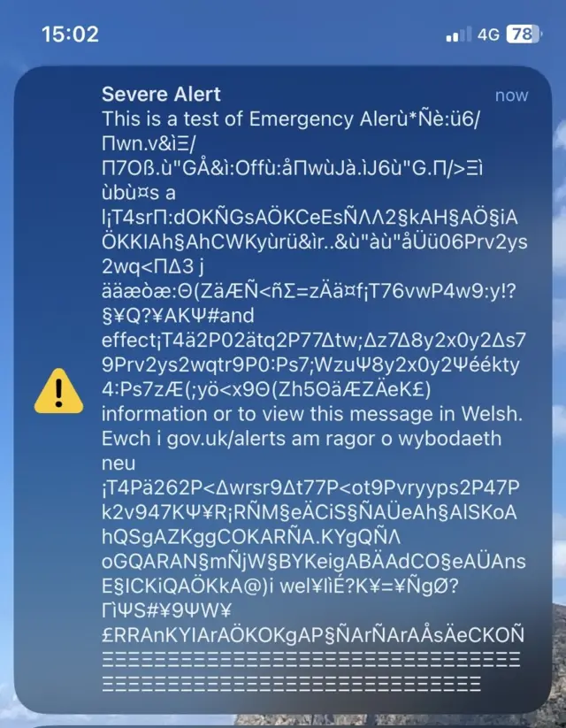 A screenshot of a garbled message following the emergency alert test in the UK.