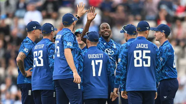 England celebrate taking the wicket of Breetzke.