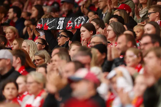 A Liverpool fan displays a scarf for Diogo Jota of Liverpool during the Barclays Women's Super League match between Liverpool and Everton at Anfield on September 07, 2025 in Liverpool, England.