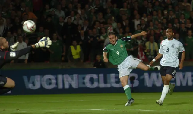 David Healy scores against England