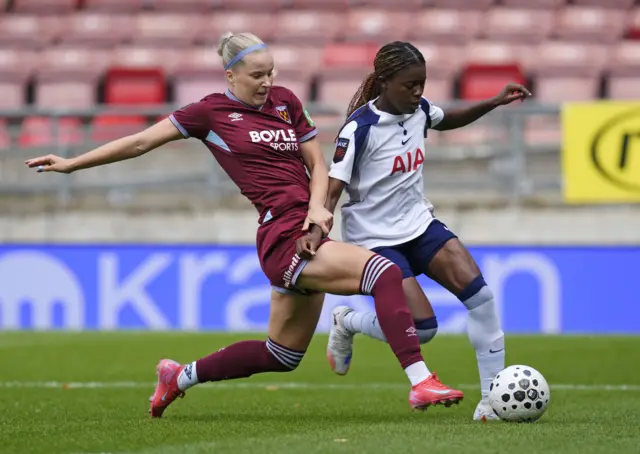 West Ham United's Eva Nystrom (left) and Tottenham Hotspur's Jessica Naz battle for the ball