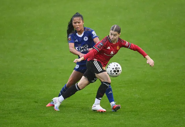 Jess Park of Manchester United is challenged by Asmita Ale