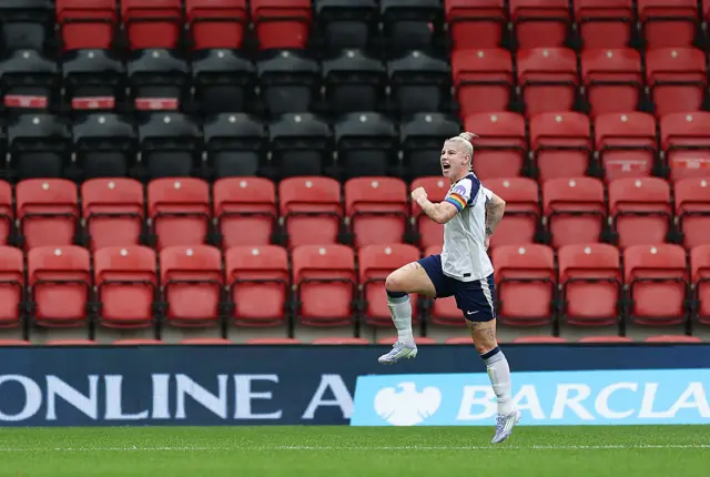 Bethany England of Tottenham Hotspur celebrates scoring her team's first goal from the penalty spot during the Barclays Women's Super League match between Tottenham Hotspur and West Ham United