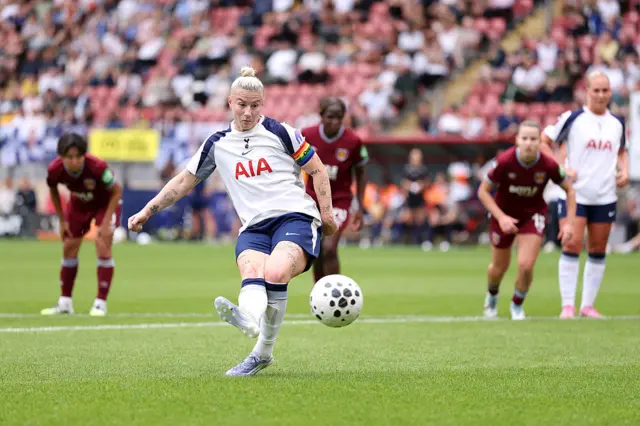 Bethany England of Tottenham Hotspur scores her team's first goal from the penalty spot during the Barclays Women's Super League match between Tottenham Hotspur and West Ham United at BetWright Stadium