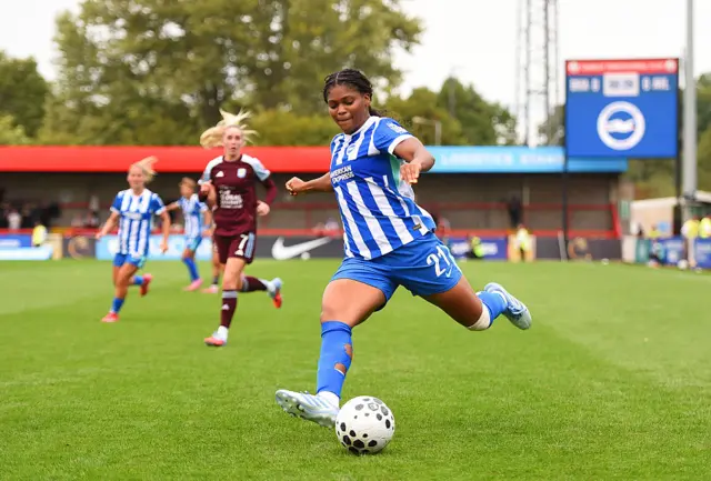 Madison Haley of Brighton & Hove Albion shoots during the Barclays Women's Super League match between Brighton & Hove Albion and Aston Villa at Broadfield Stadium on September 07, 2025 in Crawley, England.