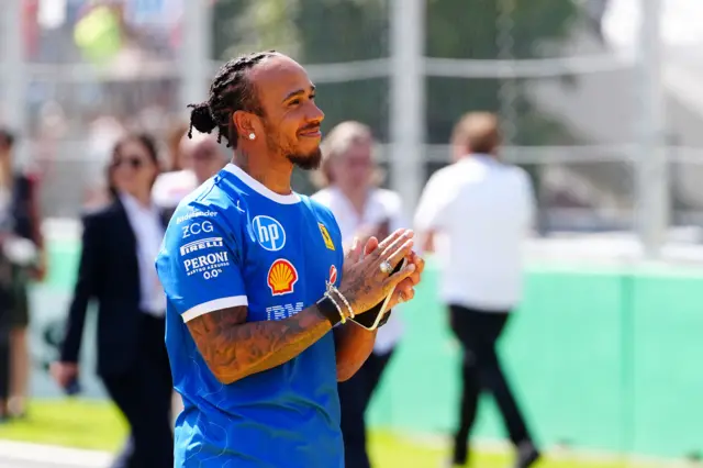 Lewis Hamilton smiles before the Italian Grand Prix