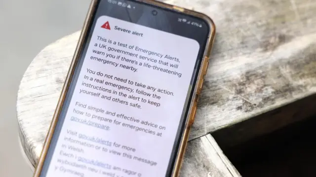 A phone reveals a nationwide emergency alert system in London, Britain, 07 September 2025.