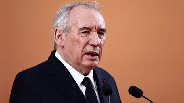 France's Prime Minister Francois Bayrou delivers a speech