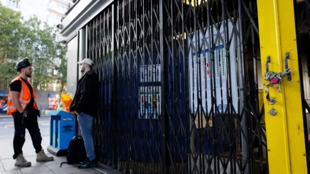 Commuters outside the closed Walthamstow Central station due to a Tube strike that has shut down nearly all London Underground services in London, Britain, 08 September 2025
