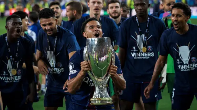 Warren Zaire-Emery lifts the Uefa Super Cup