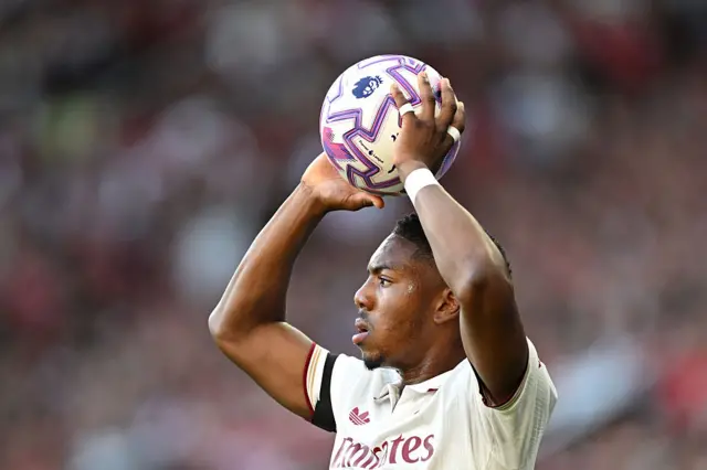 Myles Lewis-Skelly of Arsenal takes his sides throw in