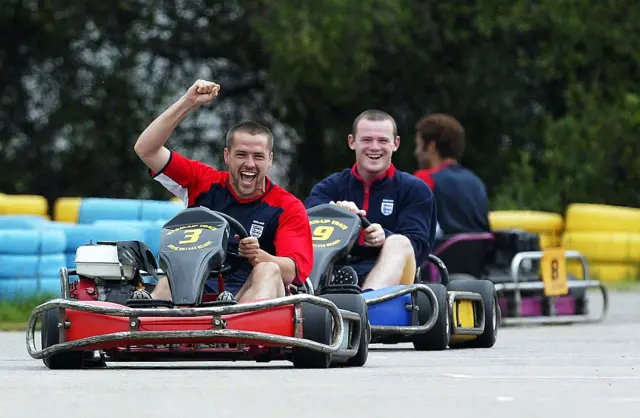 Michael Owen and Wayne Rooney on go karts