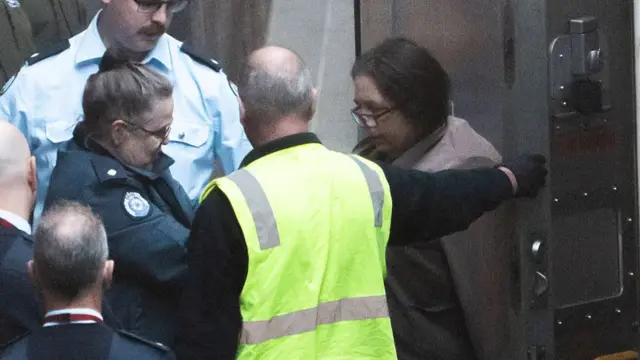 Erin Patterson is escorted to the court house ahead of her sentencing at the Supreme Court of Victoria on September 08, 2025 in Melbourne, Australia.