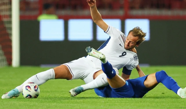 England's Harry Kane in action with Serbia's Sasa Lukic