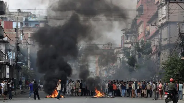 Demonstrators set fire to structures in Kathmandu