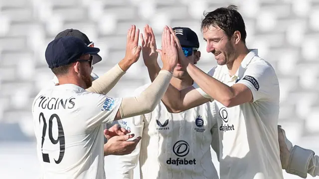 Toby Roland-Jones takes a wicket