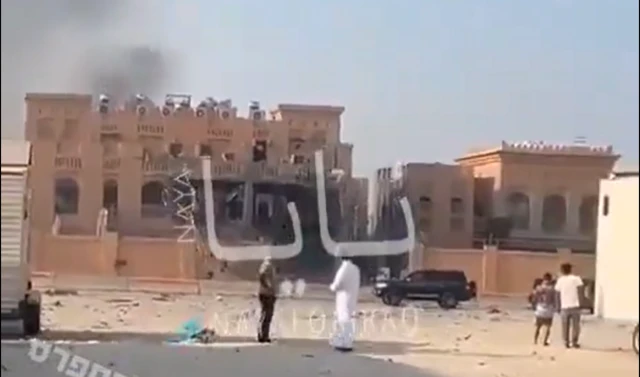 Blast damage can be seen to the building in the north of Doha - it is not clear if this was the Israelis intended target