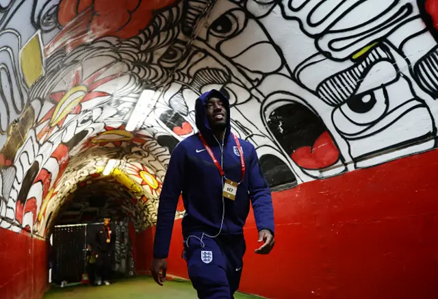 Noni Madueke walks down the tunnel