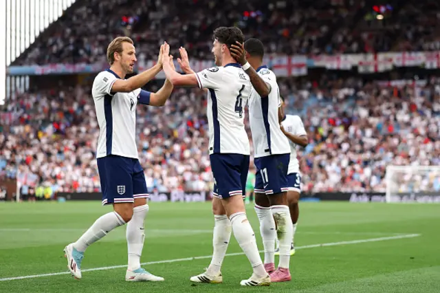 Declan Rice of England celebrates scoring his team's second goal with teammates Harry Kane and Marcus Rashford