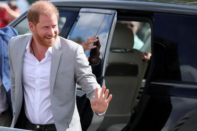Prince Harry waves