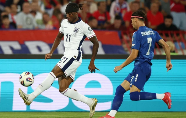 England's Noni Madueke in action with Serbia's Veljko Birmancevic