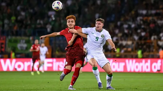 Ferguson and Piloyan battling for the ball