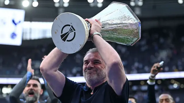 Ange Postecoglou lifts Europa League trophy