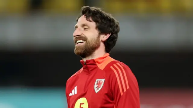 Joe Allen on Wales duty last season