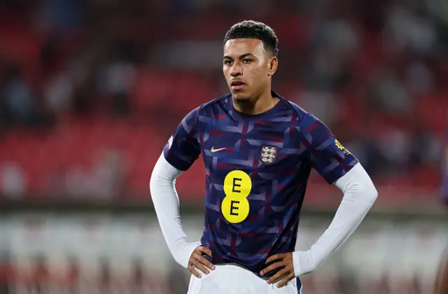 Morgan Rogers of England looks on