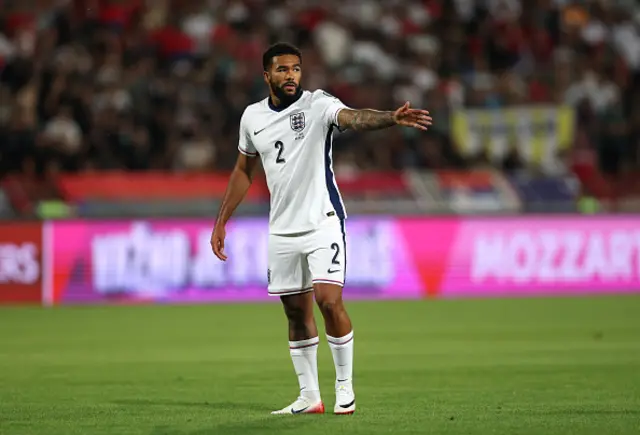Reece James of England gives instructions