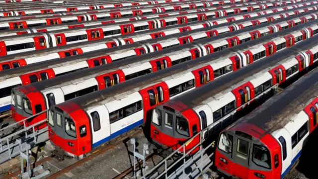 Lines of red and white tubes neatly parked in rows