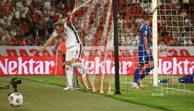 England's Harry Kane reacts after missing a chance