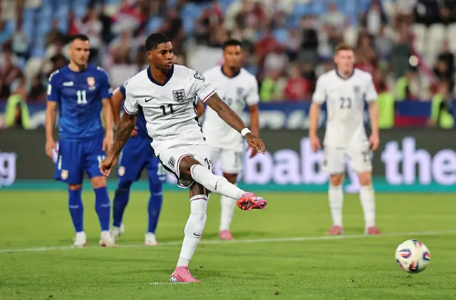 Marcus Rashford of England scores