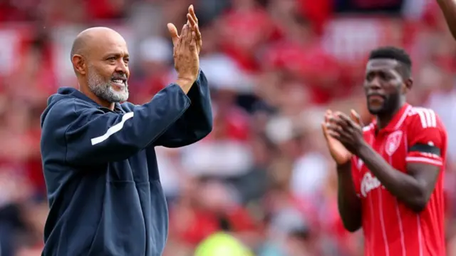 Nuno Espirito Santo Head Coach of Nottingham Forest applauds the fans
