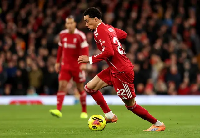 Hugo Ekitike of Liverpool runs with the ball during the Premier League match between Liverpool and Leeds United at Anfield on January 01, 2026 in Liverpool, England.