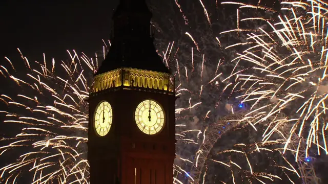 Big Ben with fireworks behind