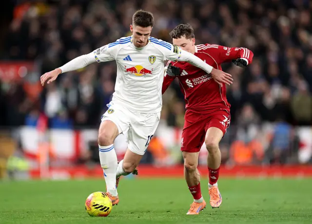Anton Stach of Leeds United is challenged by Florian Wirtz of Liverpool during the Premier League match between Liverpool and Leeds United at Anfield on January 01, 2026 in Liverpool, England. (