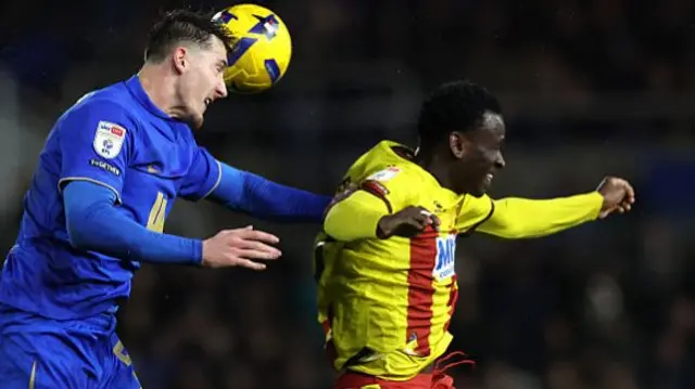 Birmingham's Phil Neumann outjumps Watford's Mamadou Doumbia to a header.