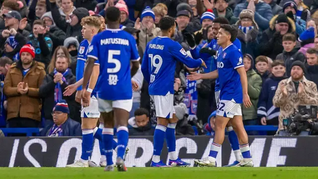 Ipswich Town players celebrate after scoring for their side
