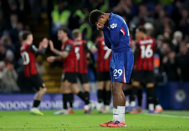 Wesley Fofana reacts with his head in his heads after Bournemouth score against Chelsea.