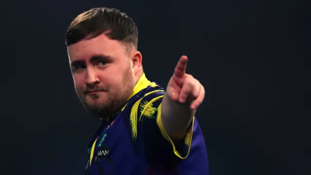 Luke Littler celebrates