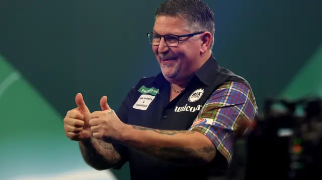 Gary Anderson celebrates