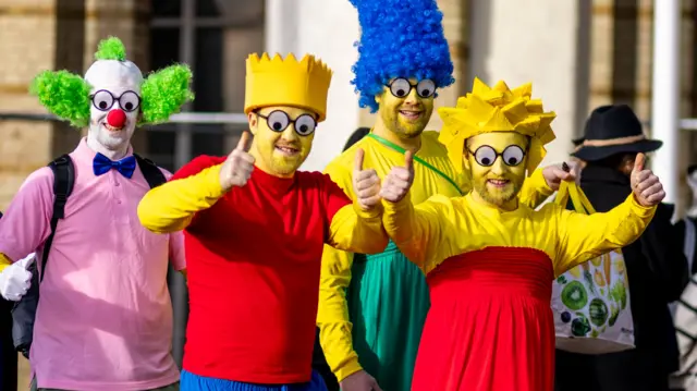 Darts fans in fancy dress