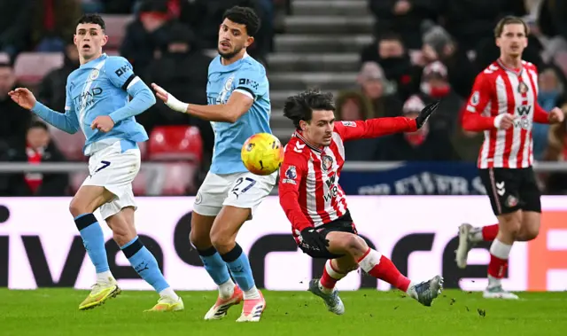 Sunderland's French midfielder #28 Enzo Le Fee (R) battles with Manchester City's Portuguese midfielder #27 Matheus Nunes (L) during the English Premier League football match between Sunderland and Manchester City